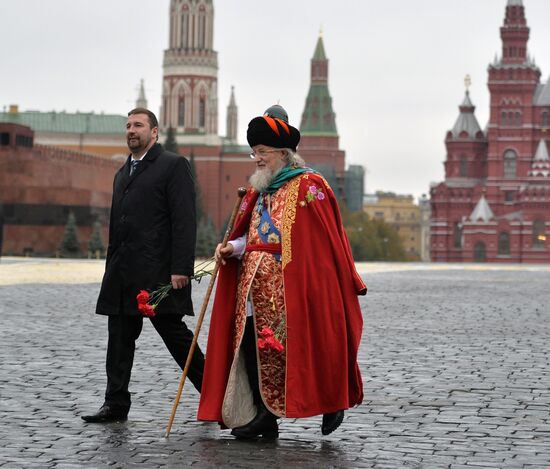 President Putin lays flowers at Minin and Pozharsky monument on Red Square