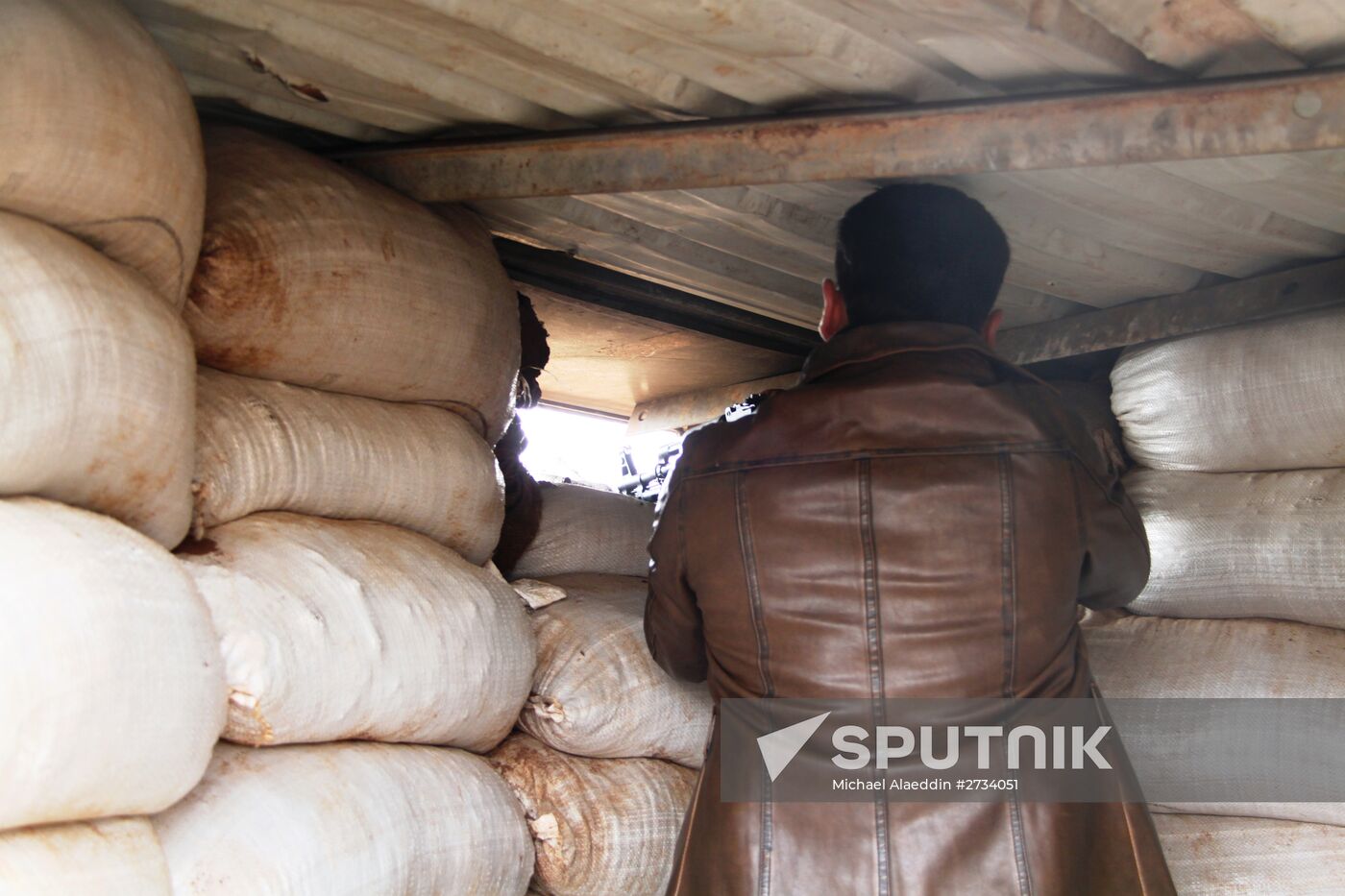 Syrian Army fighters in positions in Al-Shaykh Maskin