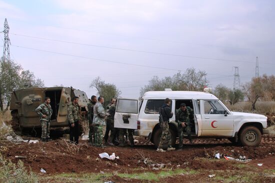 Syrian Army fighters in positions in Al-Shaykh Maskin