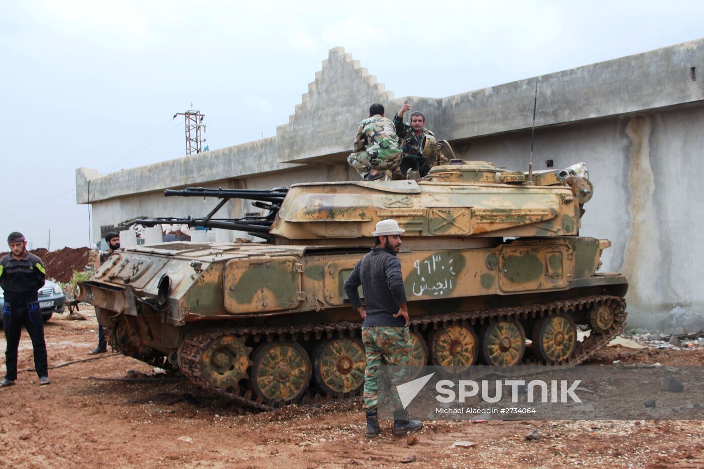 Syrian Army fighters in positions in Al-Shaykh Maskin