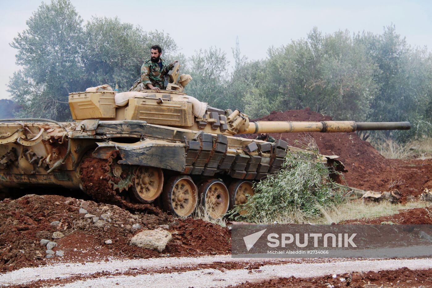 Syrian Army fighters in positions in Al-Shaykh Maskin