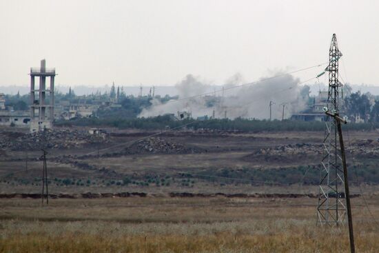 Syrian Army fighters in positions in Al-Shaykh Maskin