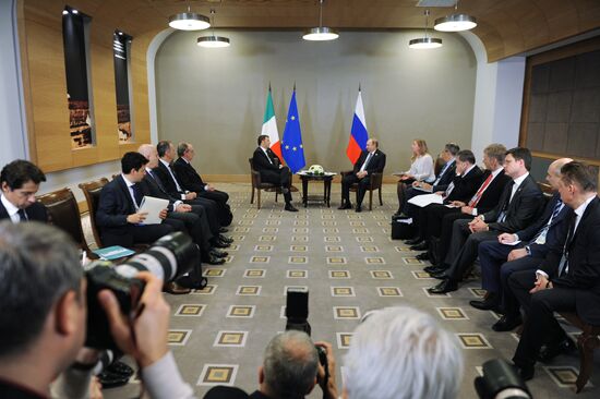 Russian President Vladimir Putin meets with Italian Prime Minister Matteo Renzi