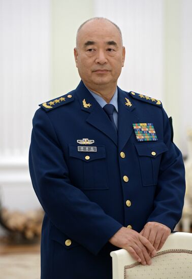 Russian President Vladimir Putin meets with Vice Chairman of China's Central Military Commission Xu Qiliang
