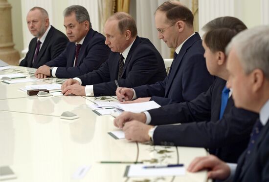 Russian President Vladimir Putin meets with Vice Chairman of China's Central Military Commission Xu Qiliang