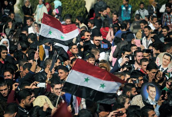 Al-Baath University students hold rally in support of Russia's military operation in Syria