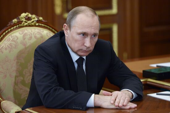 Russian President Vladimir Putin meets with Astrakhan Region Governor Alexander Zhilkin