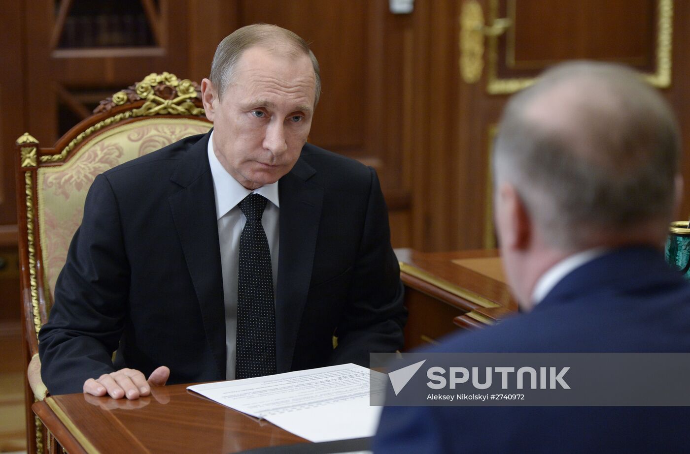 Russian President Vladimir Putin meets with businessman Musa Bazhayev