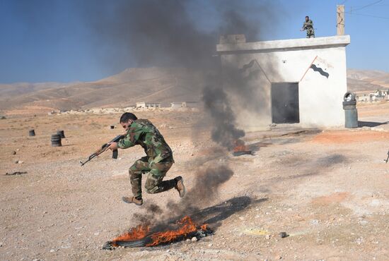 Self-defense fighters' training center in Syria