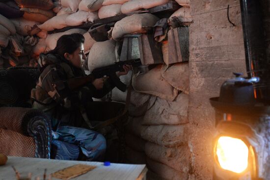 Soldiers of the Syrian Arab Army in Darayya, a Damascus suburb
