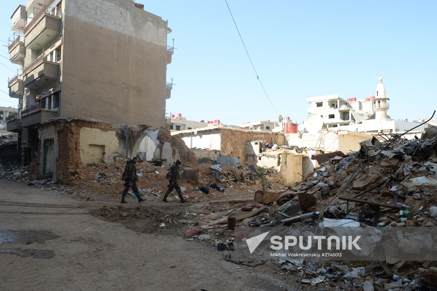 Soldiers of the Syrian Arab Army in Darayya, a Damascus suburb