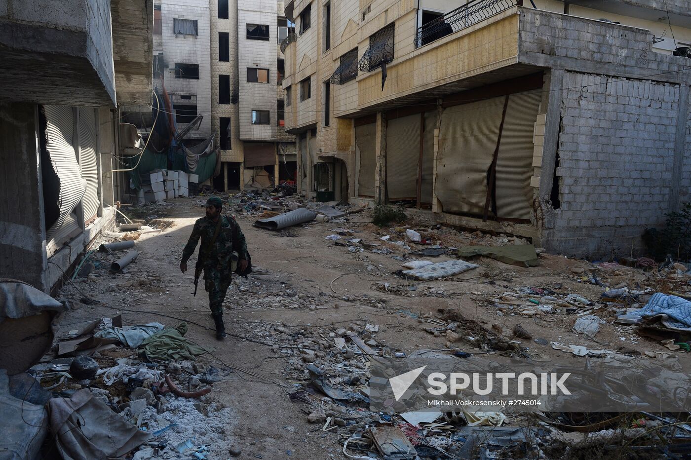 Soldiers of the Syrian Arab Army in Darayya, a Damascus suburb