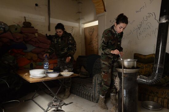 Soldiers of the Syrian Arab Army in Darayya, a Damascus suburb
