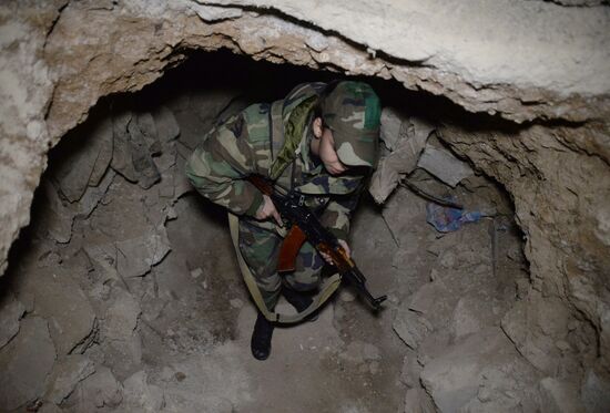 Soldiers of the Syrian Arab Army in Darayya, a Damascus suburb