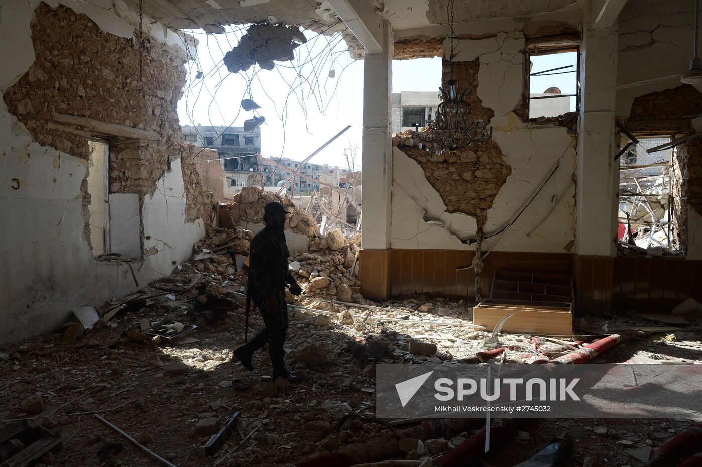 Soldiers of the Syrian Arab Army in Darayya, a Damascus suburb