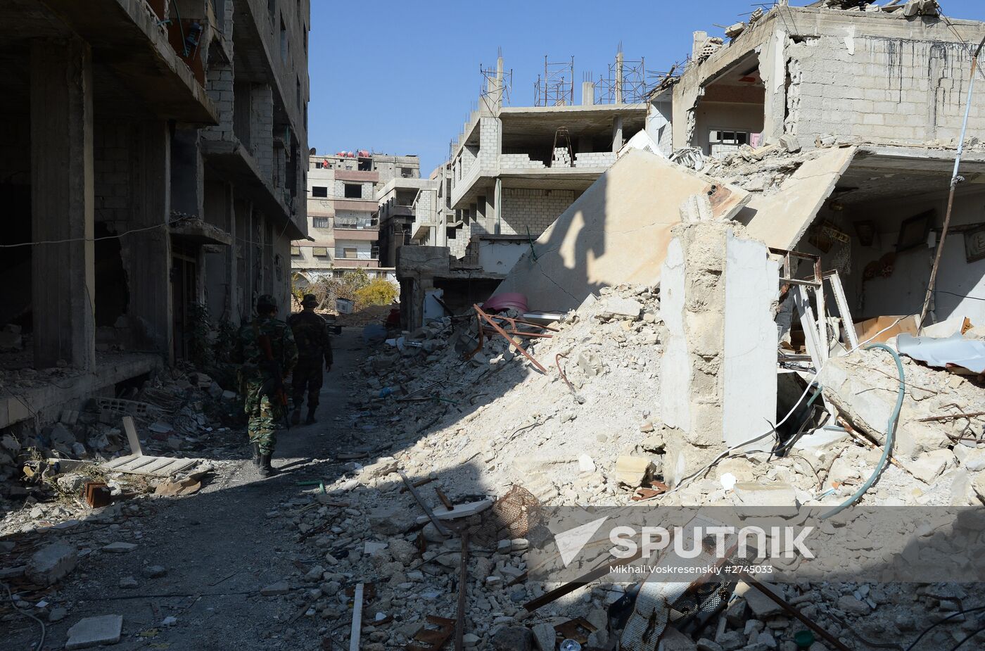 Soldiers of the Syrian Arab Army in Darayya, a Damascus suburb