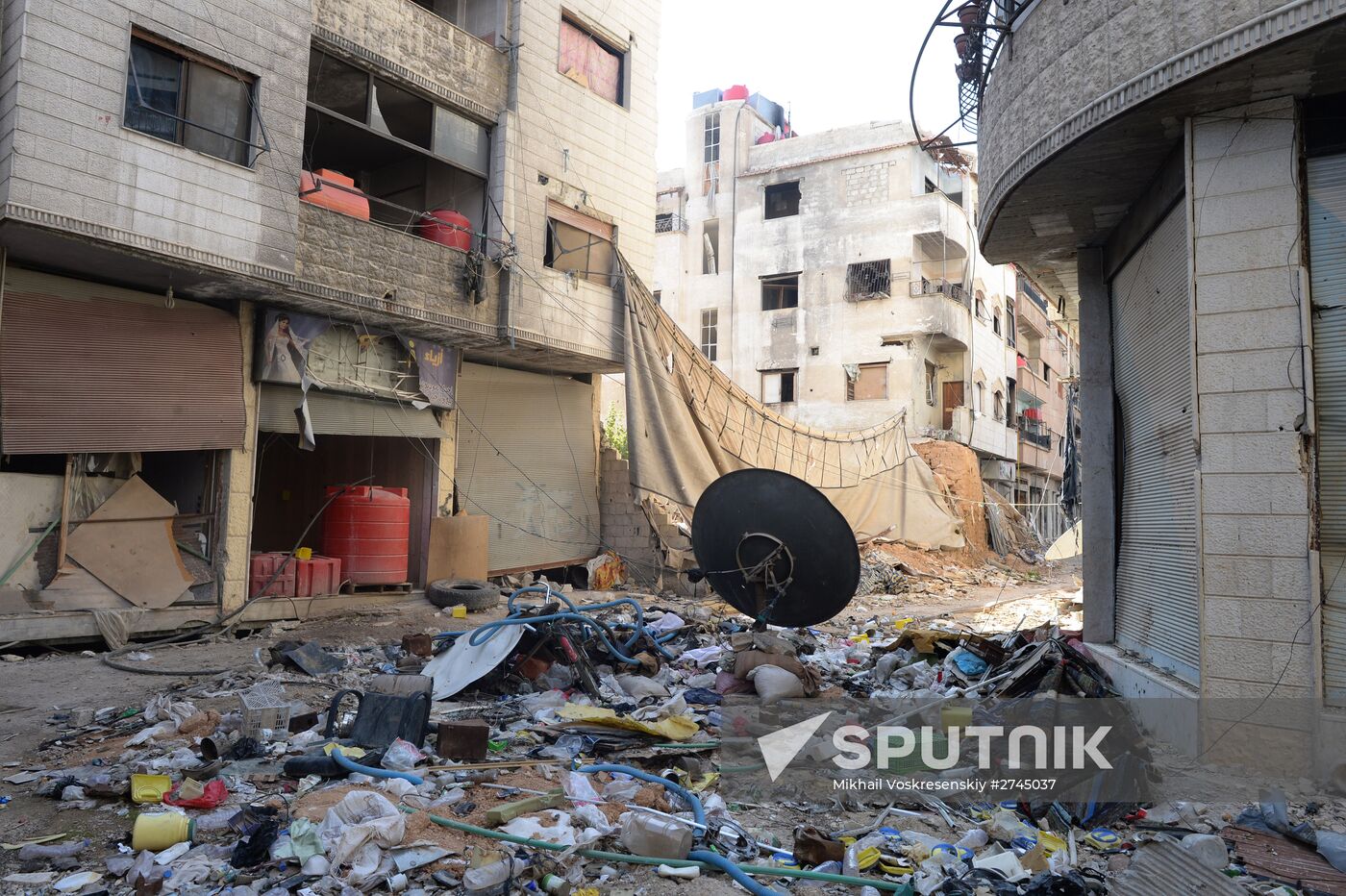 Soldiers of the Syrian Arab Army in Darayya, a Damascus suburb