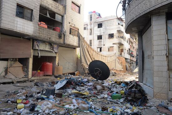 Soldiers of the Syrian Arab Army in Darayya, a Damascus suburb