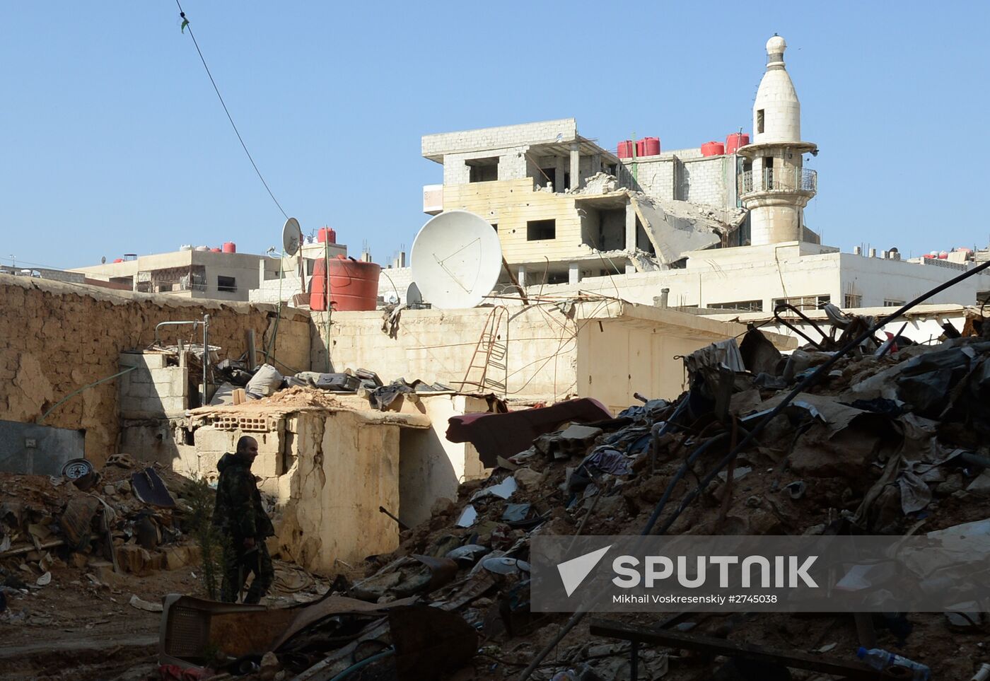 Soldiers of the Syrian Arab Army in Darayya, a Damascus suburb.