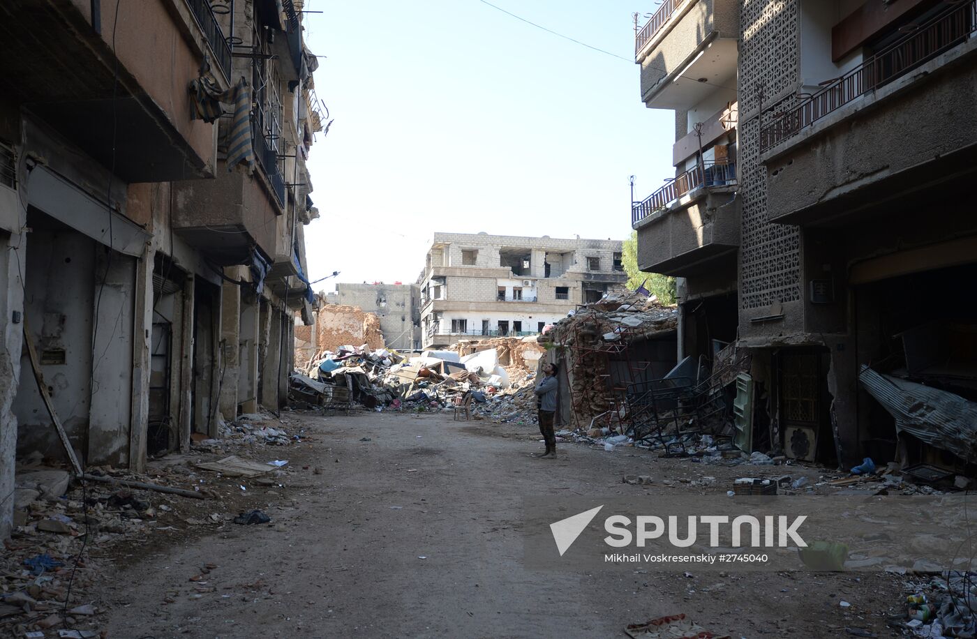 Soldiers of the Syrian Arab Army in Darayya, a Damascus suburb