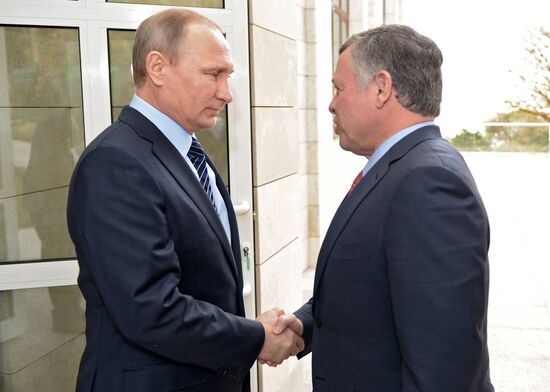 Russian President Vladimir Putin meets with King Abdullah II of Jordan