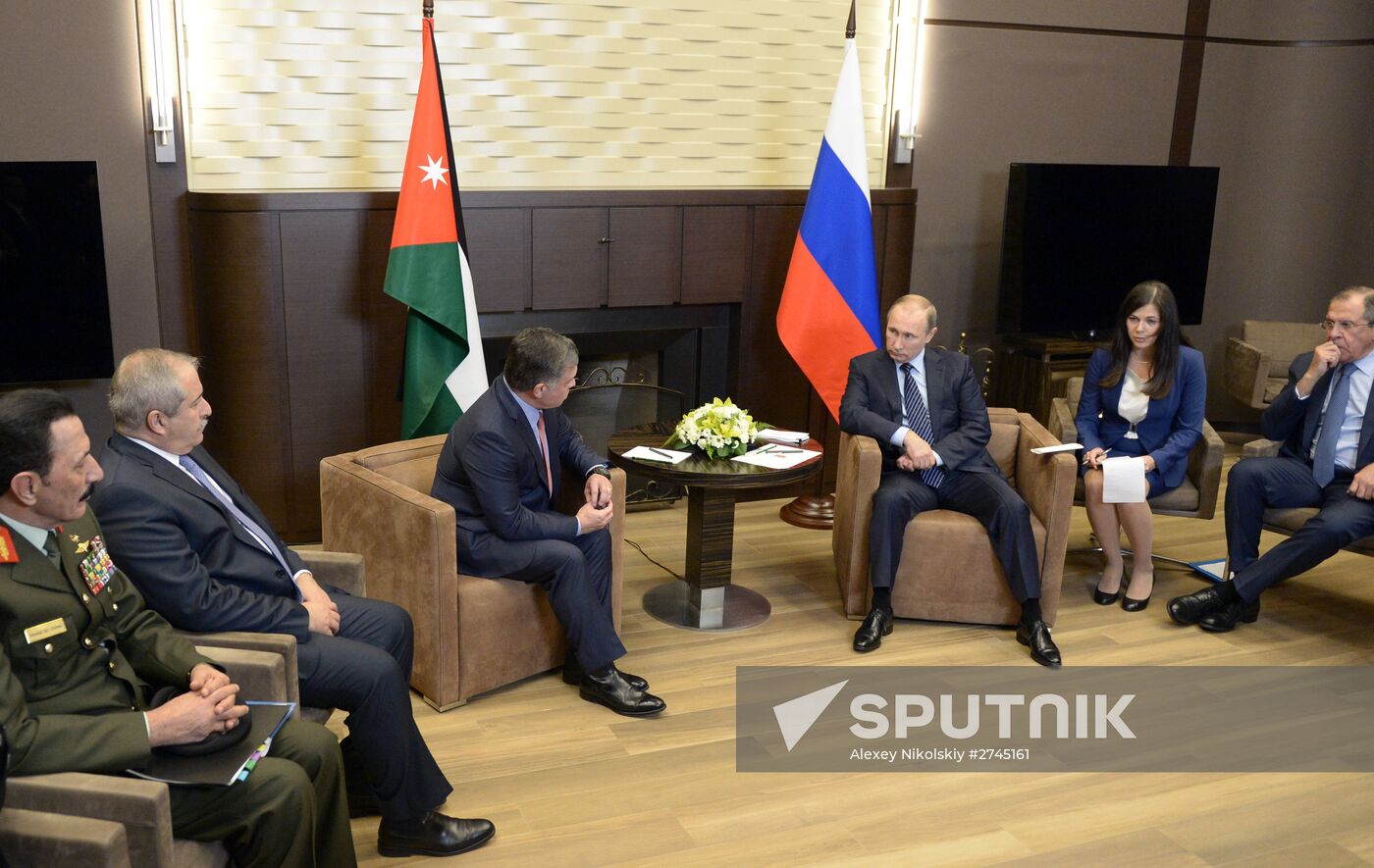 Russian President Vladimir Putin meets with King Abdullah II of Jordan