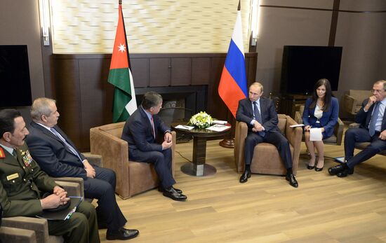 Russian President Vladimir Putin meets with King Abdullah II of Jordan