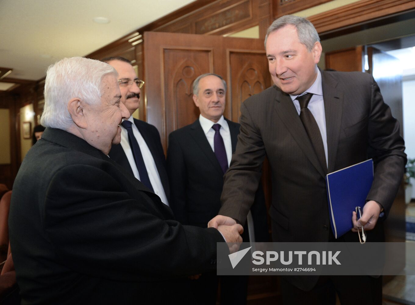 Russian Deputy Prime Minister Dmitry Rogozin meets with Foreign Minister of Syria Walid Muallem