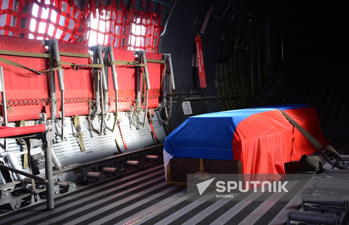 Coffin with body of Russian pilot Oleg Peshkov flown from Turkey to Russia