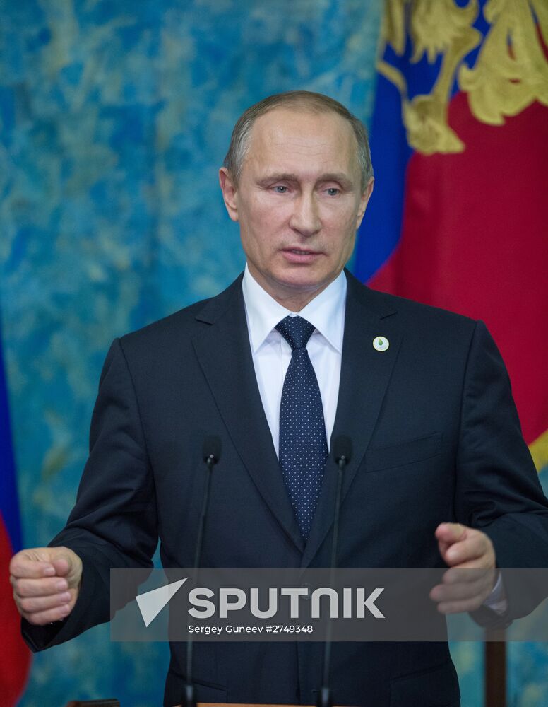 Russian President Vladimir Putin at the news conference following his participation in the 21st Session of the Conference of the Parties to the United Nations Framework Convention on Climate Change, November 30, 2015. Location: France, Paris. Author: Sergey Guneev/Sputnik. Russian President Vladimir Putin visits France