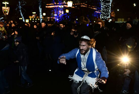Lighting Hanukkah candles on Revolution Square in Moscow