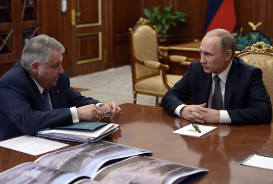 Russian President Vladimir Putin meets with Kurchatov Institute director Mikhail Kovalchuk