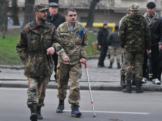 Ukrainian soldiers stage protest in Lviv