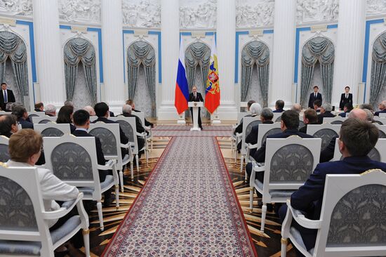 Russian President Vladimir Putin presents state awards