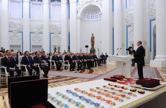 Russian President Vladimir Putin presents state awards
