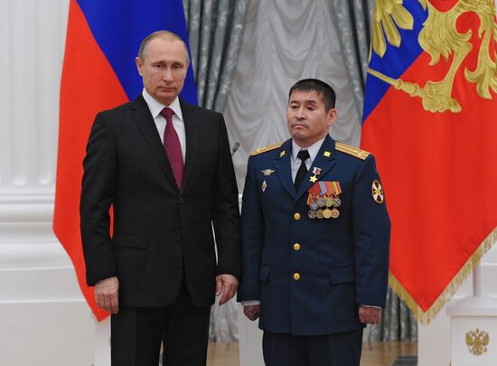 Russian President Vladimir Putin presents state awards