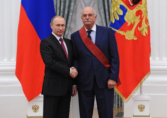 Russian President Vladimir Putin presents state awards