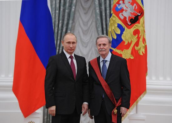Russian President Vladimir Putin presents state awards