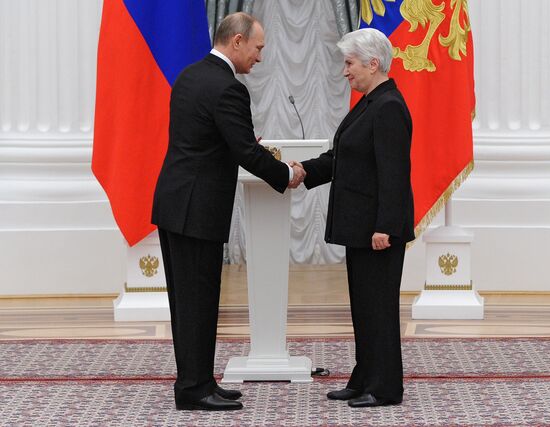 Russian President Vladimir Putin presents state awards