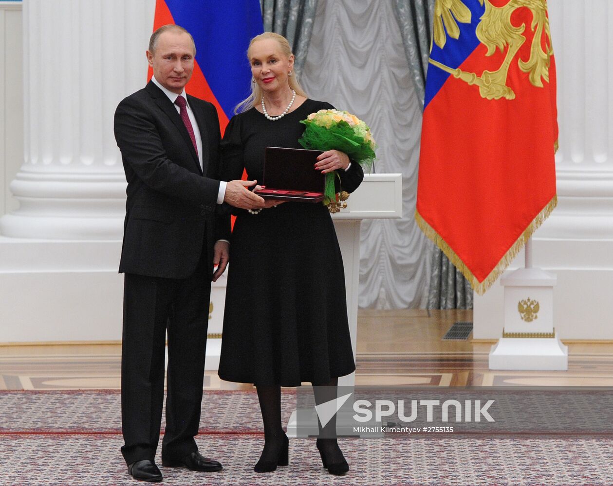 Russian President Vladimir Putin presents state awards