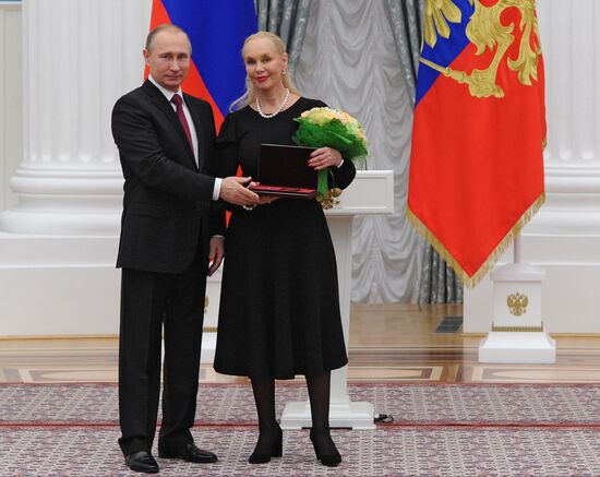 Russian President Vladimir Putin presents state awards