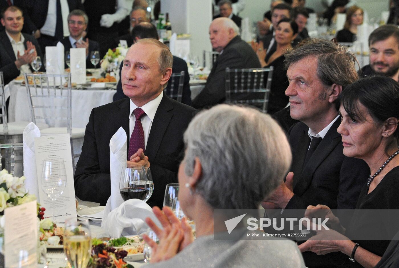 Vladimir Putin visits exhibition marking Russia Today news channel's 10th anniversary