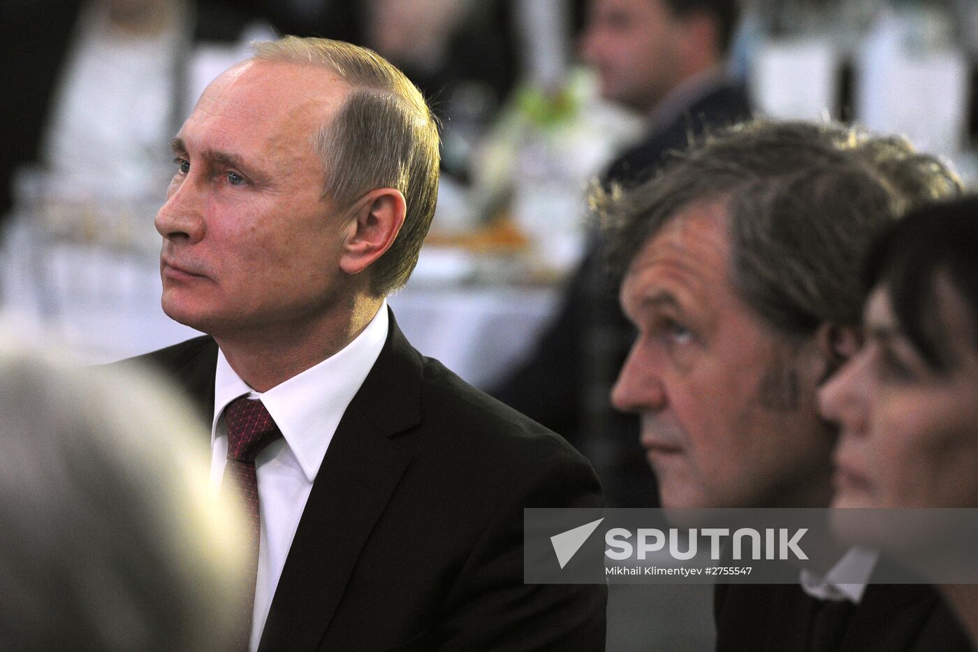 Vladimir Putin visits exhibition marking Russia Today news channel's 10th anniversary