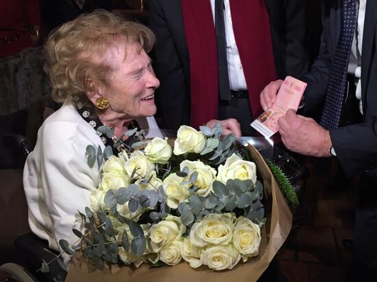 Russian ambassador in France A. Orlov presents Baroness Irina von Dreyer with Russian passport