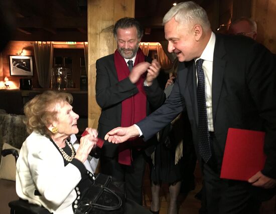 Russian ambassador in France A. Orlov presents Baroness Irina von Dreyer with Russian passport