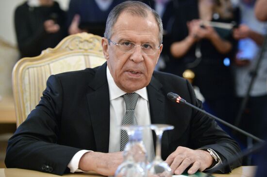 Russian Foreign Minister Sergey Lavrov meets with US Secretary of State John Kerry