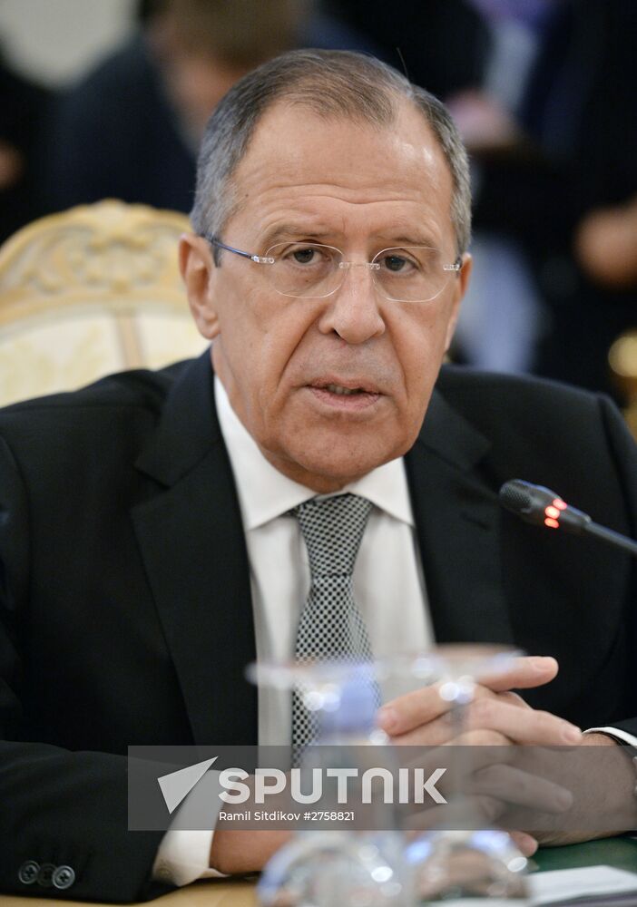 Russian Foreign Minister Sergey Lavrov meets with US Secretary of State John Kerry