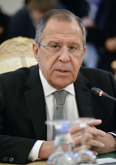 Russian Foreign Minister Sergey Lavrov meets with US Secretary of State John Kerry
