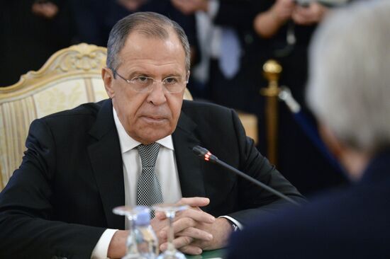 Russian Foreign Minister Sergey Lavrov meets with US Secretary of State John Kerry
