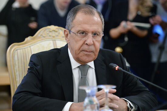 Russian Foreign Minister Sergey Lavrov meets with US Secretary of State John Kerry